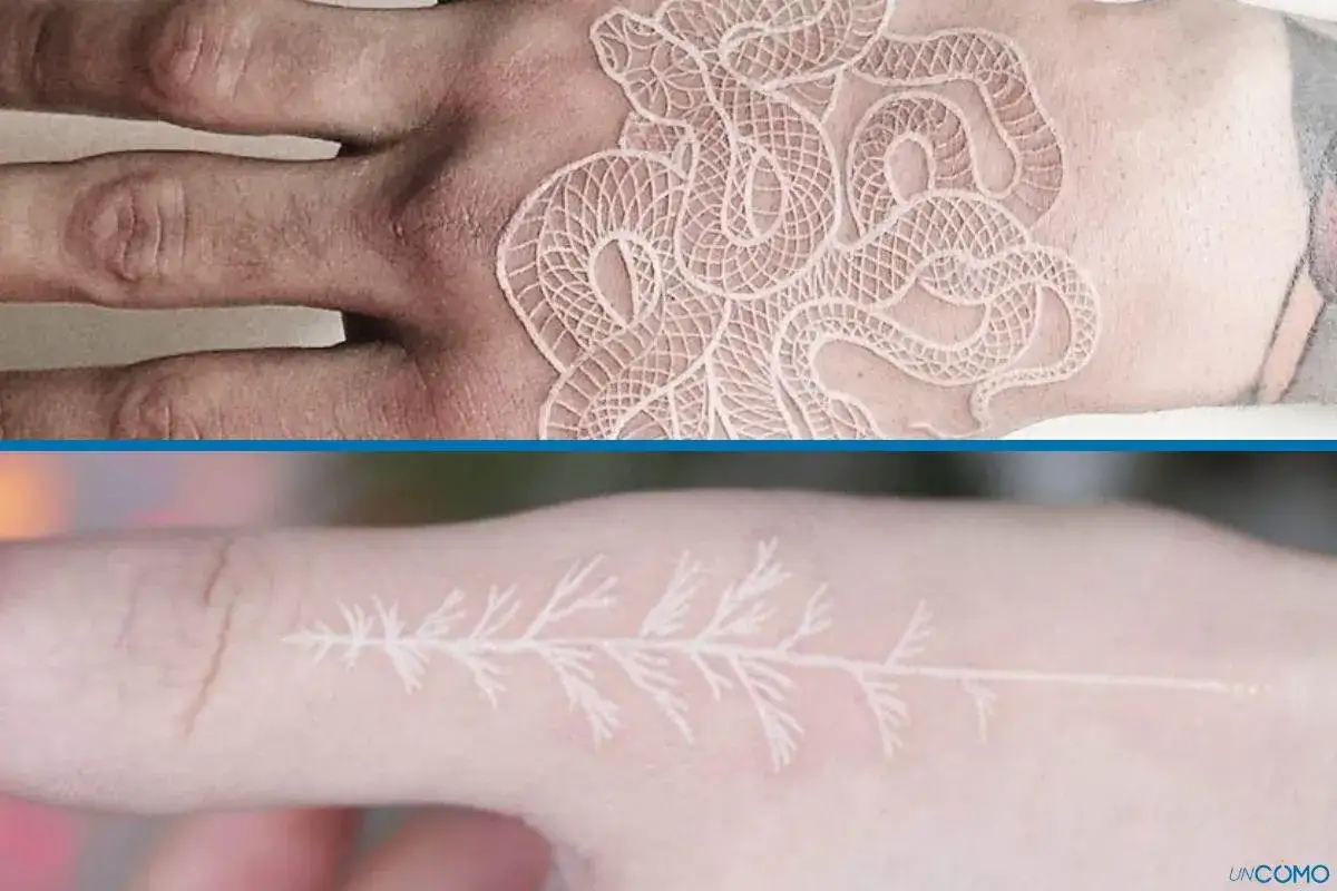 Un delicado tatuaje blanco de serpiente enroscada en una mano y una rama de &aacute;rbol en un dedo.