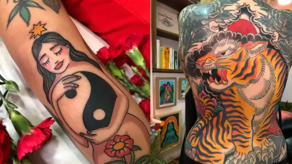 Tatuaje de una mujer con símbolo yin-yang y un tigre rugiendo en la espalda, estilo Diana Deets.
